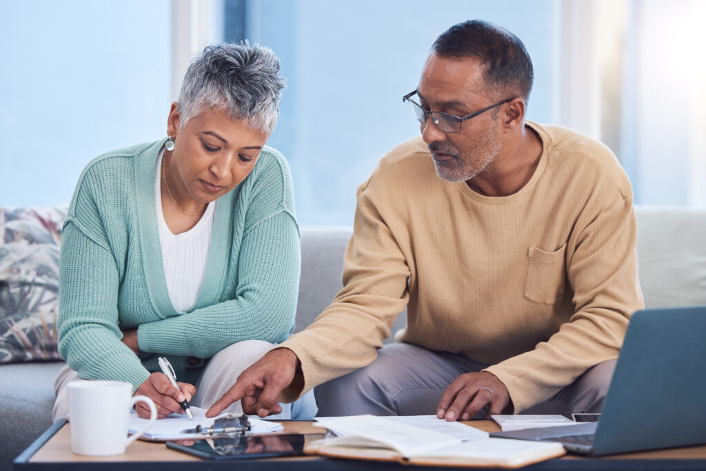 A man and woman are sitting at a table