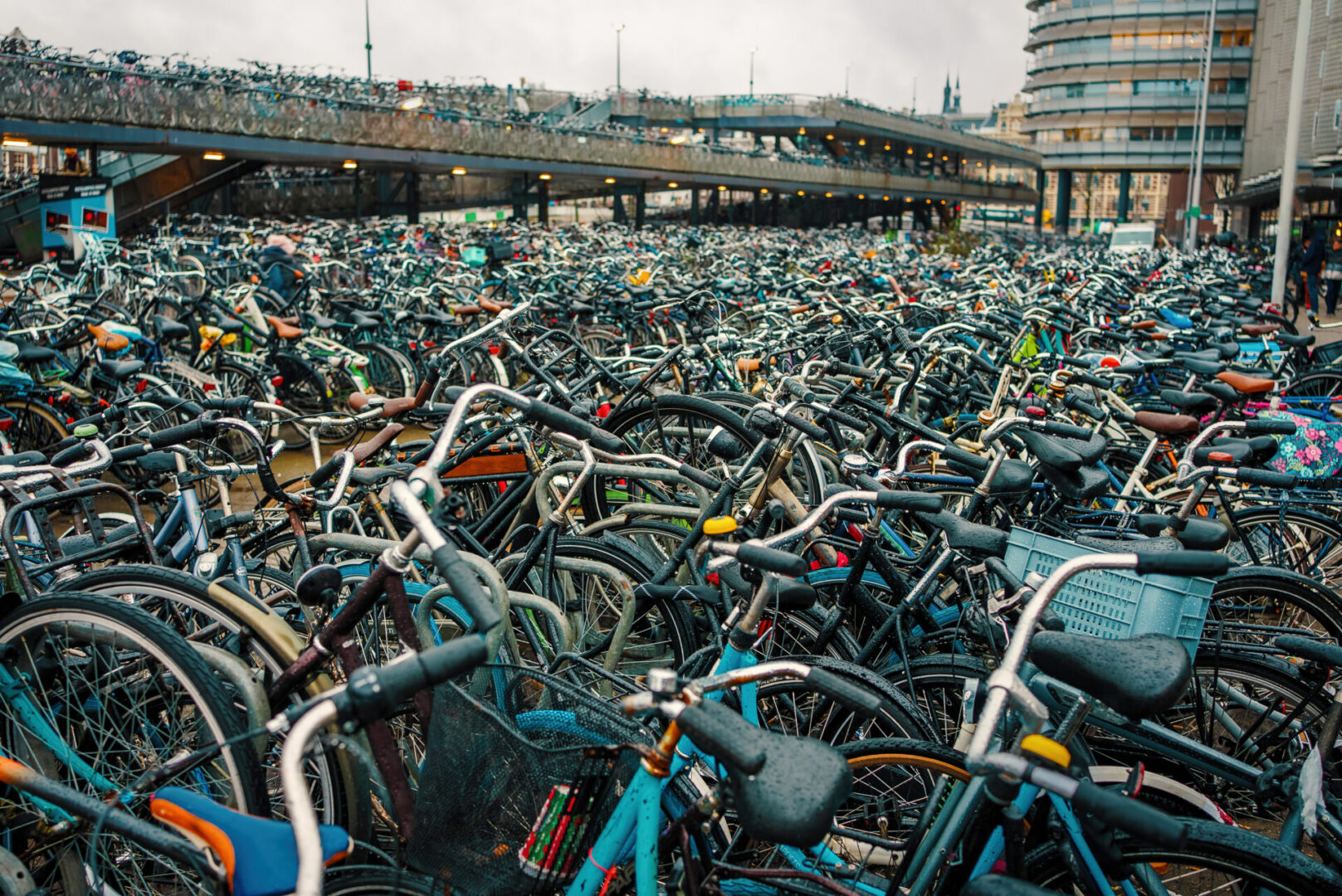 Plenty bicycles at parking lot in Amsterdam.